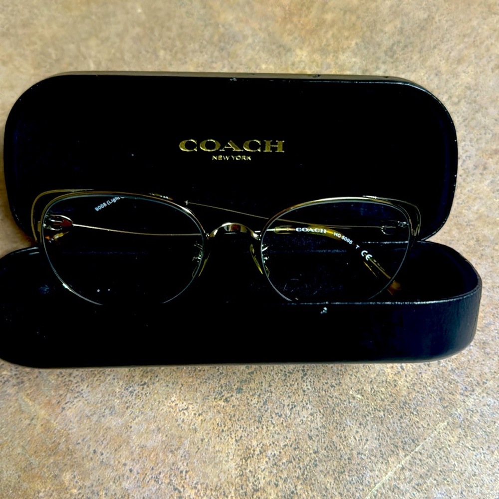 Coach glasses.